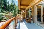 Expansive balcony overlooking outdoor pool and hot tubs